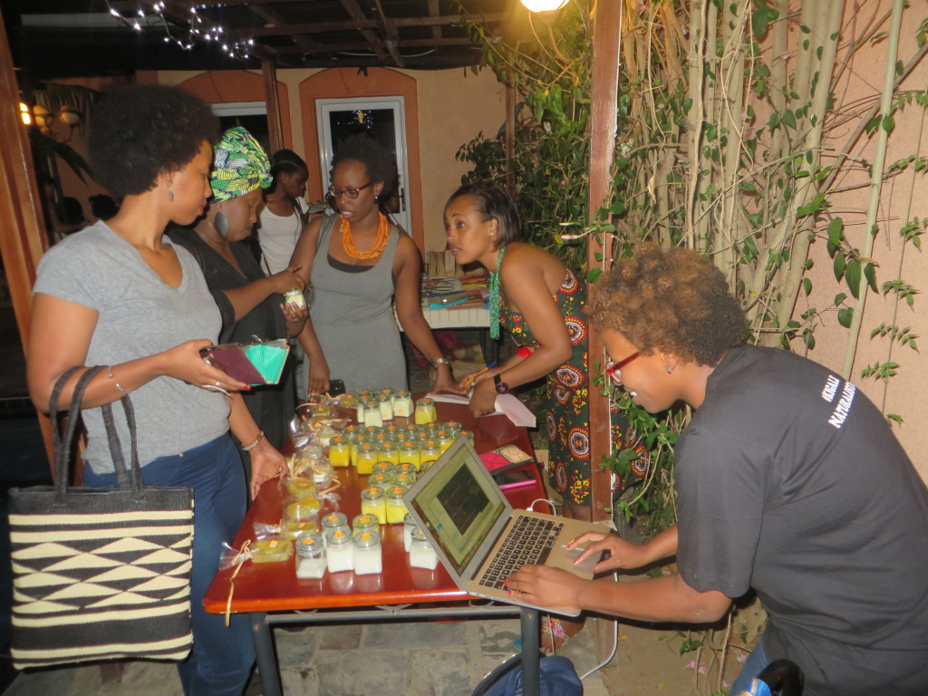 Getting into the handmade natural hair products at the  Rose & Co. table.